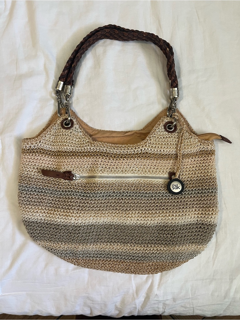 The Sak Neutral Striped Crochet Shoulder Bag with Brown Braided Handles